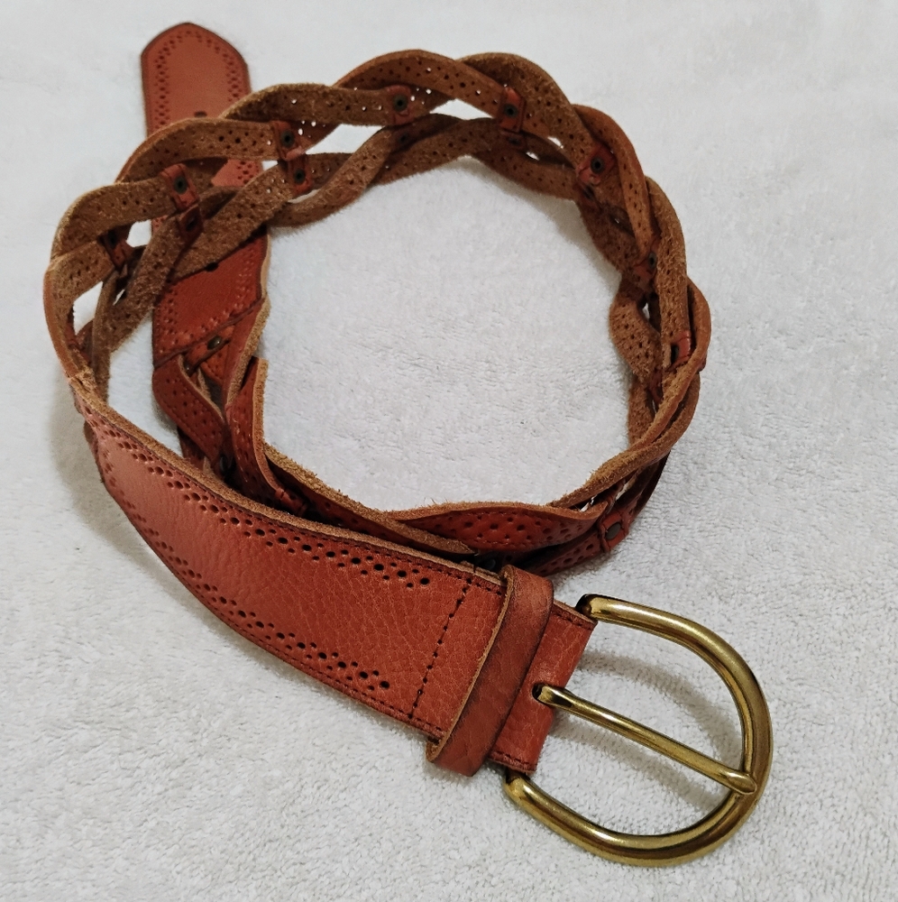 Braided leather belt with gold colored buckle